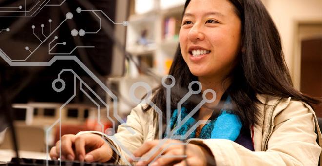 Female student working on computer with data pattern overlay